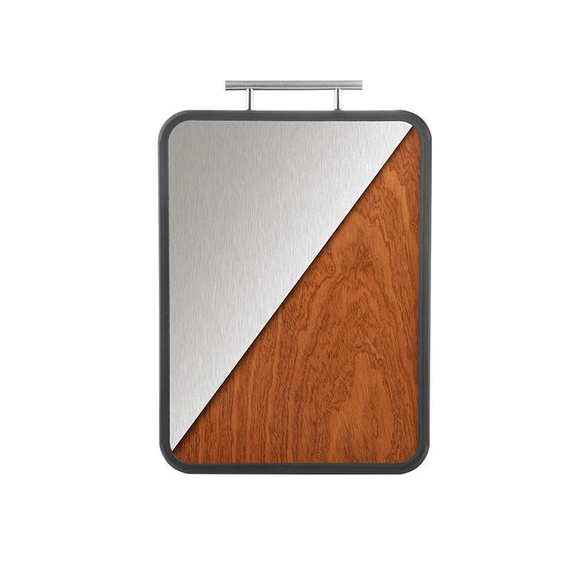 Cutting board with wooden and titanium surface on a white background
