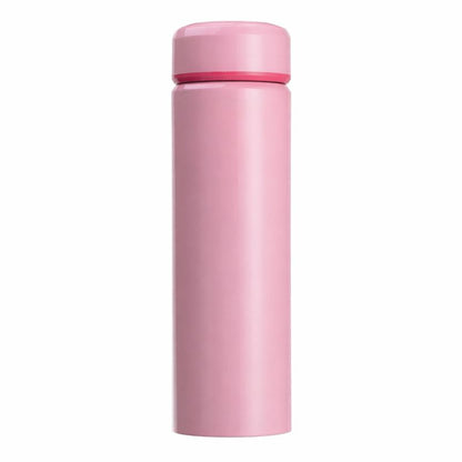 Pink thermos bottle on a white background