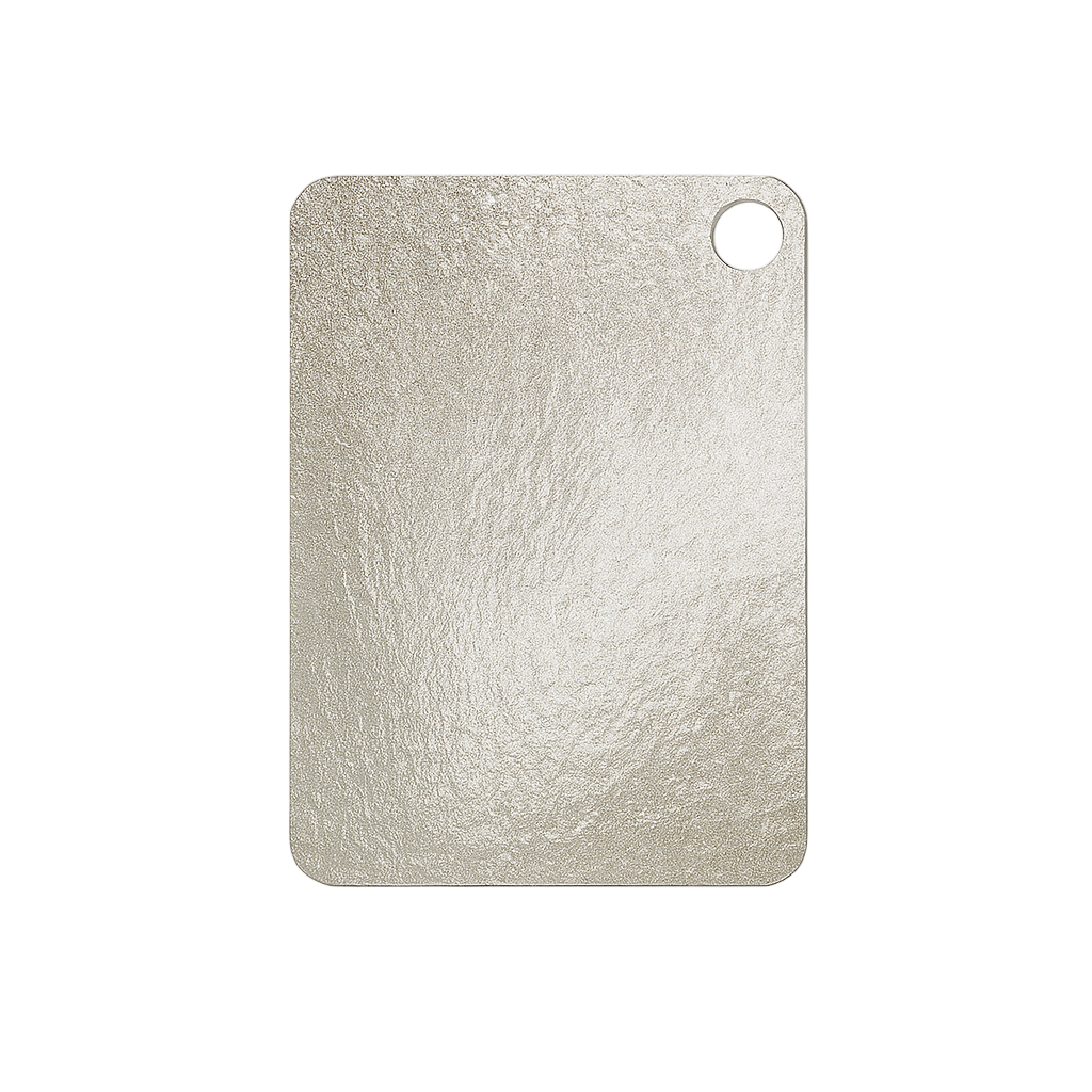 Textured silver cutting board on a light gray background
