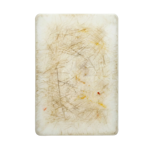 Scratched cutting board on a white background