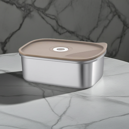 Stainless steel container with a brown lid on a marble surface