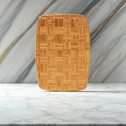 Wooden cutting board with a woven pattern on a marble background