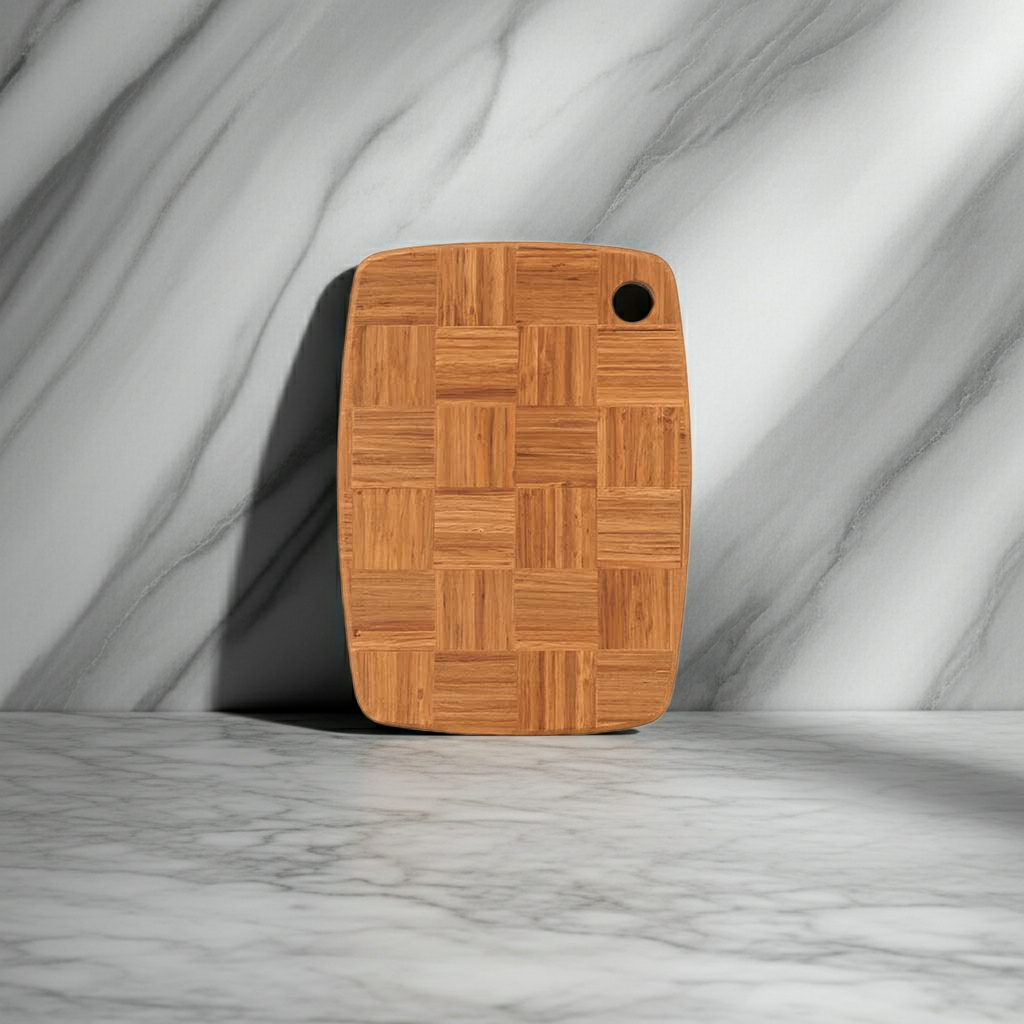 Wooden cutting board with a checkered pattern on a marble background
